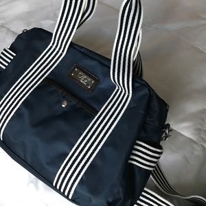 Stylish bag with white/navy blue stripes